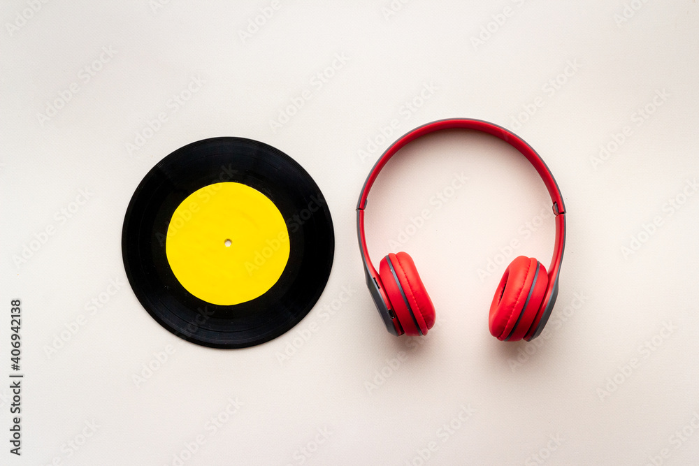 Vinyl record with headphones, music flat design background Vinyl record with headphones, music flat design background