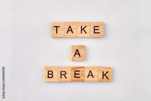 Take a break text on cubes on white background. Time to relax and stop the work.