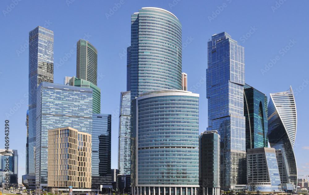 Modern tall buildings in Moscow in commercial district. Skyscraper made of glass and steal.