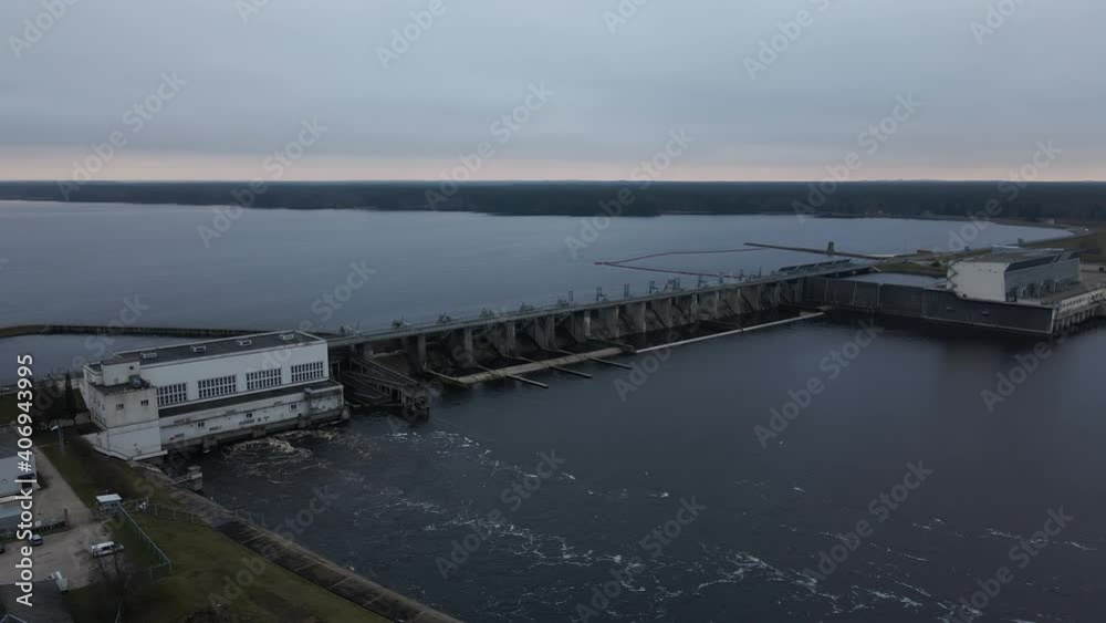 Aerial view over hydroelectric power plant in Kegums, Latvia nad river Daugava during daytime Aerial view over hydroelectric power plant in Kegums, Latvia nad river Daugava during daytime