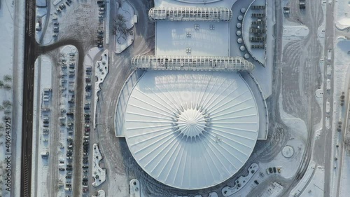 Top view in winter of a modern sports complex with parking in Minsk. Belarus photo