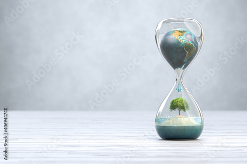 Earth planet in hourglass, Global warming concept. photo