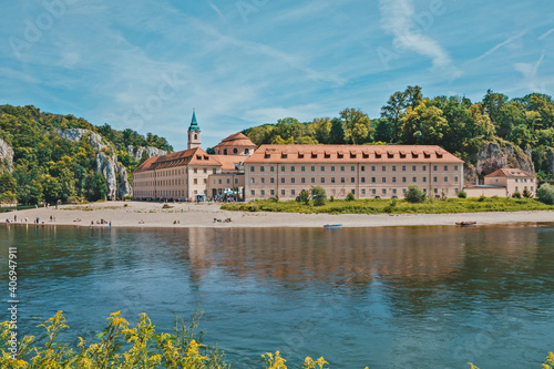 Panorama view on Weltenburg Abbey. This landmark is a Benedictine monastery in Weltenburg in Kelheim on the Danube in Bavaria, Germany. photo