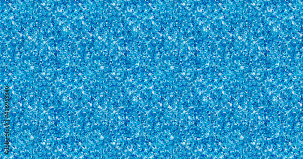 Top view of swimming pool with water shining in the sun with mosaic blue tiles Top view of swimming pool with water shining in the sun with mosaic blue tiles