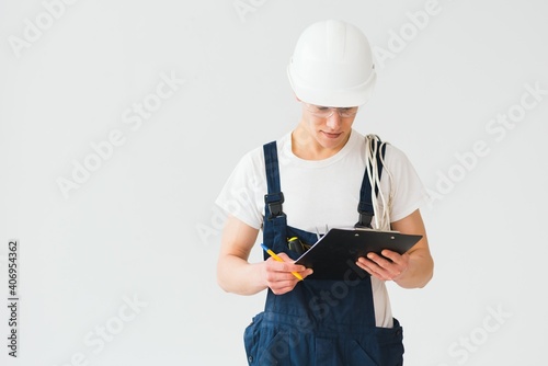 Builder in helmets on a white background