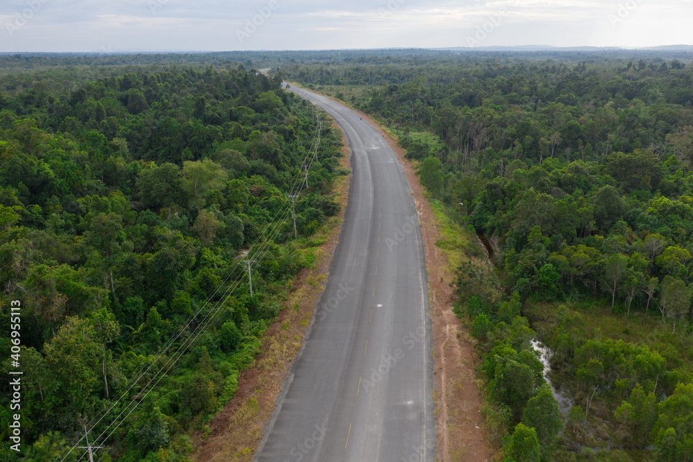 Aerial drone view of trail in spring tropical forest Aerial drone view of trail in spring tropical forest