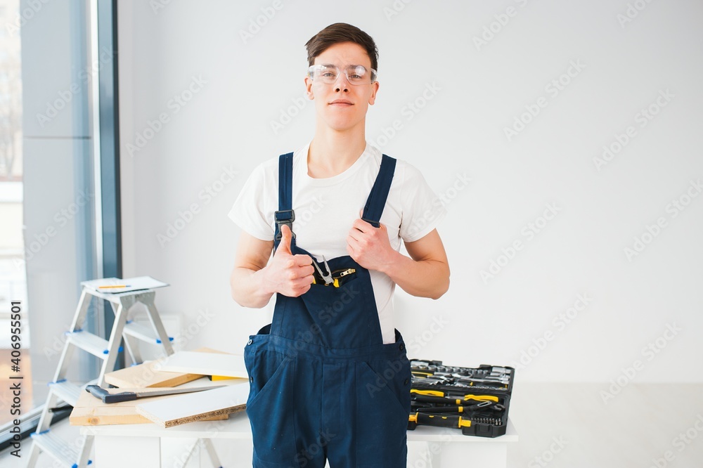 Hilarious busy constructor repairing apartment Hilarious busy constructor repairing apartment