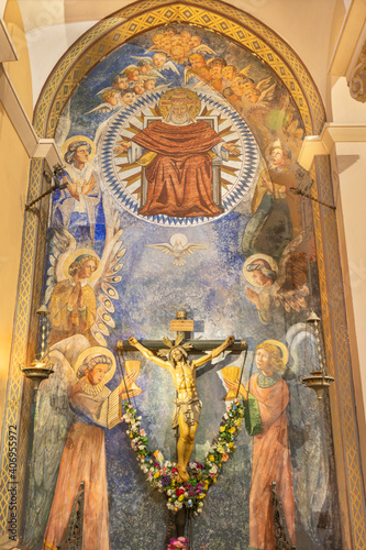 BARCELONA, SPAIN - MARCH 4, 2020: The modern fresco of Holy Trinity in church Iglesia Sant Angel Custodi from 20. cent. photo