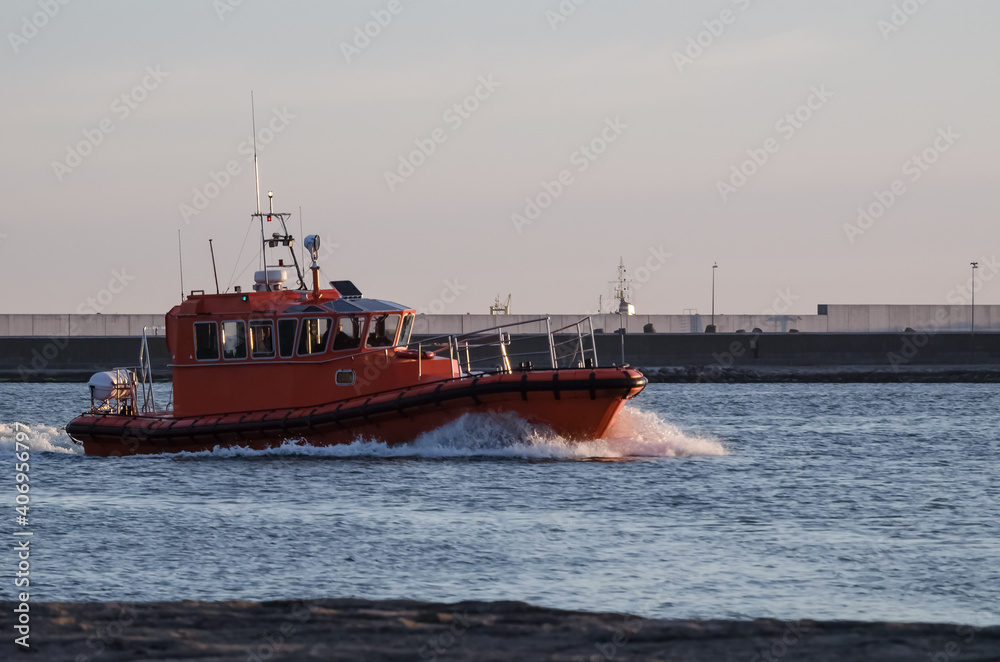PILOT BOAT - The fast motorboat sails to seaport
PILOT BOAT - The fast motorboat sails to seaport