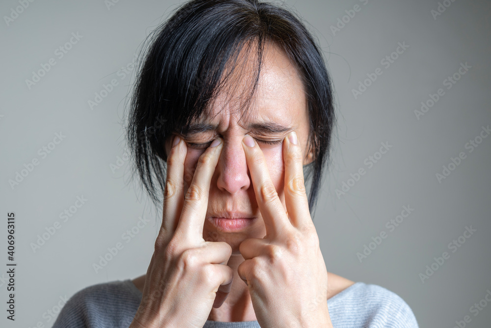 Face yoga, facial gymnastics, daily self care routine. Middle age caucasian woman performing facial exercises at home Face yoga, facial gymnastics, daily self care routine. Middle age caucasian woman performing facial exercises at home