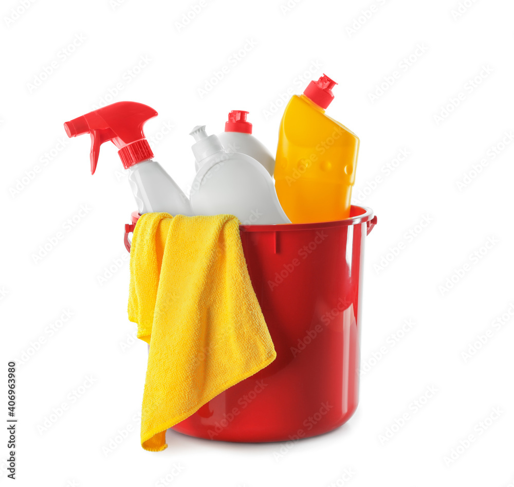 Plastic bucket with different cleaning products and rag on white background Plastic bucket with different cleaning products and rag on white background