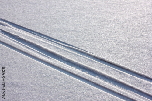 Skiing track in snow. Winter natural background photo