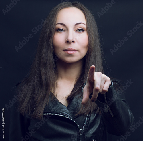  woman pointing at the samera