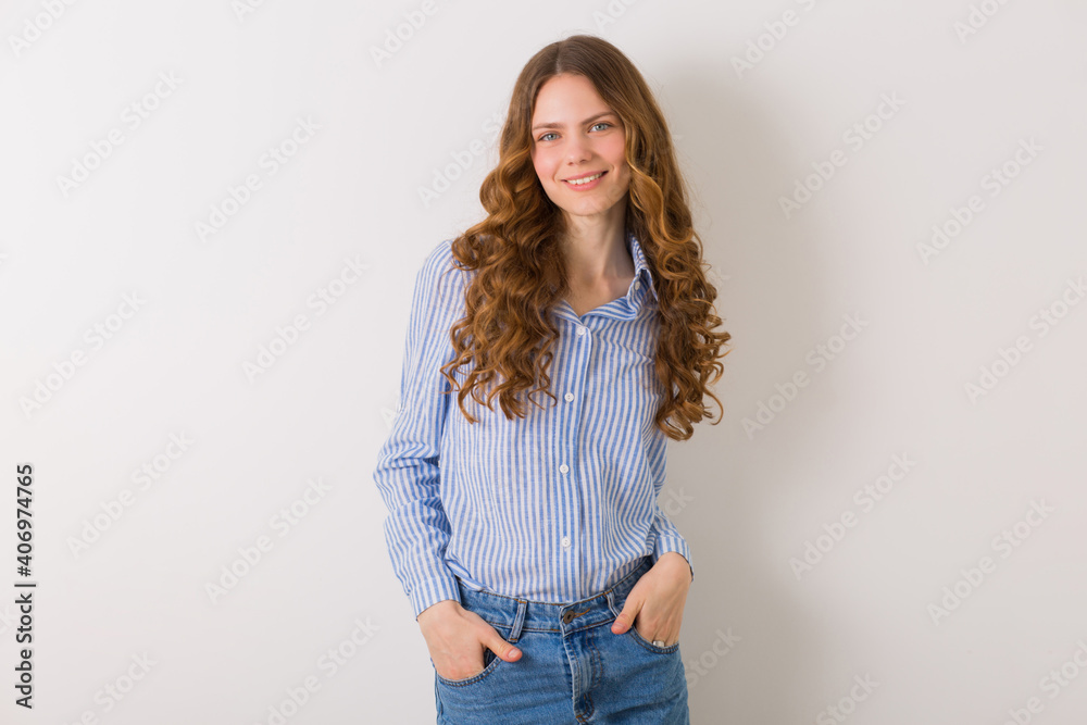 portrait of curly pretty young woman with blond culry long hair portrait of curly pretty young woman with blond culry long hair