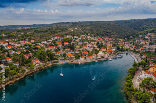 Splitska bay on Brac island view, Dalmatia, Croatia. Aerial drone panoramic picture. August 2020