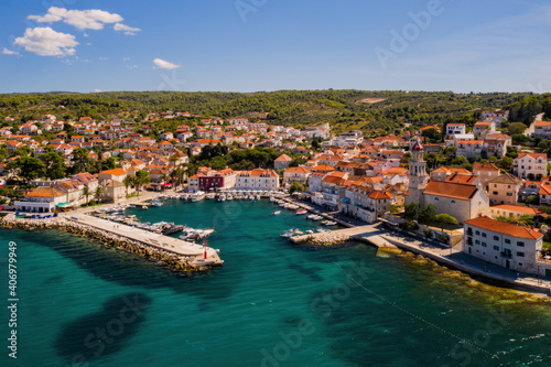 Town of Sutivan skyline view, Island of Brac, Croatia. Aerial drone view in august 2020