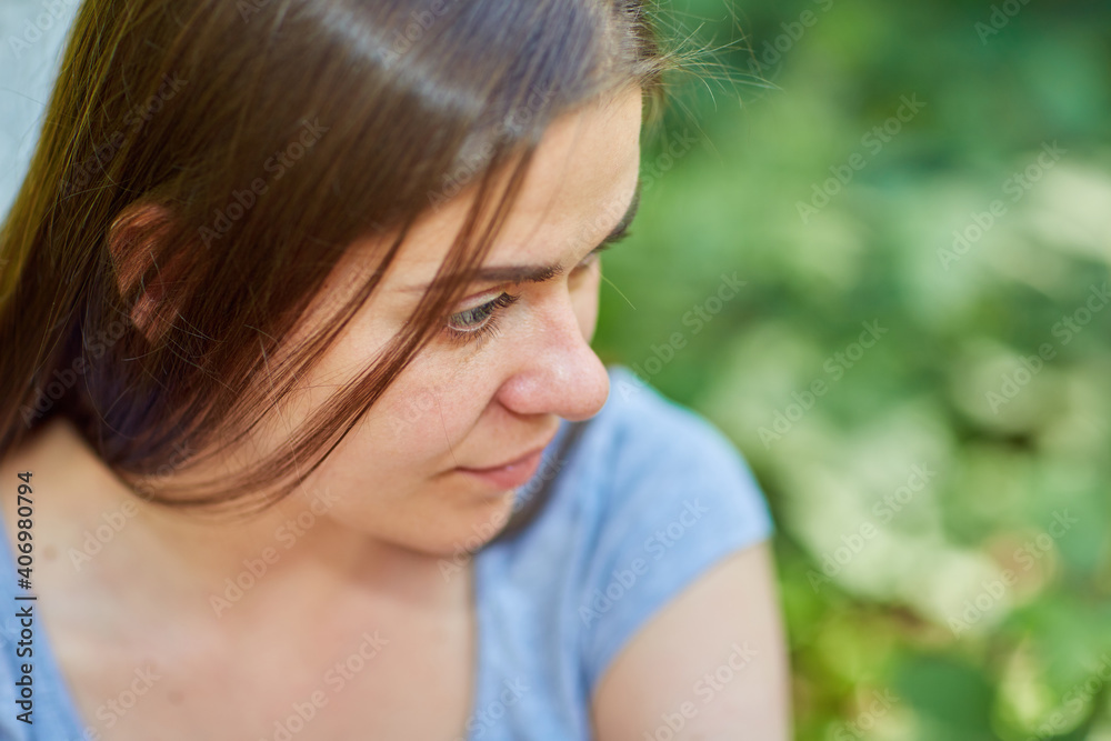 Close up face portrait of woman looking away Close up face portrait of woman looking away