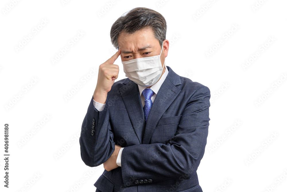 Portrait of a middle-aged Asian businessman wearing a white face mask. White Background. Covid19, Health, and Business Concepts. Portrait of a middle-aged Asian businessman wearing a white face mask. White Background. Covid19, Health, and Business Concepts.