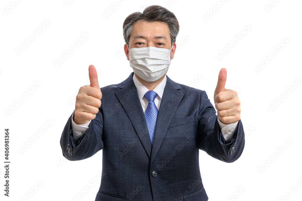 Portrait of a middle-aged Asian businessman wearing a white face mask. White Background. Covid19, Health, and Business Concepts. Portrait of a middle-aged Asian businessman wearing a white face mask. White Background. Covid19, Health, and Business Concepts.