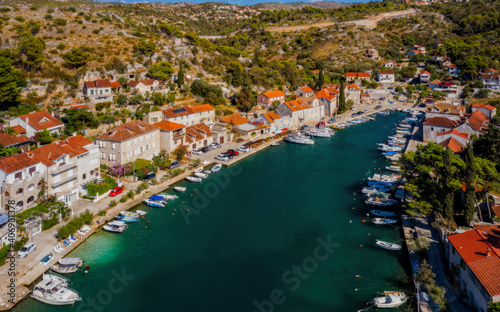 Fototapeta Naklejka Na Ścianę i Meble -  Bobovisca Na Moru village aerial view, Island of Brac, Dalmatia, Croatia. August 2020