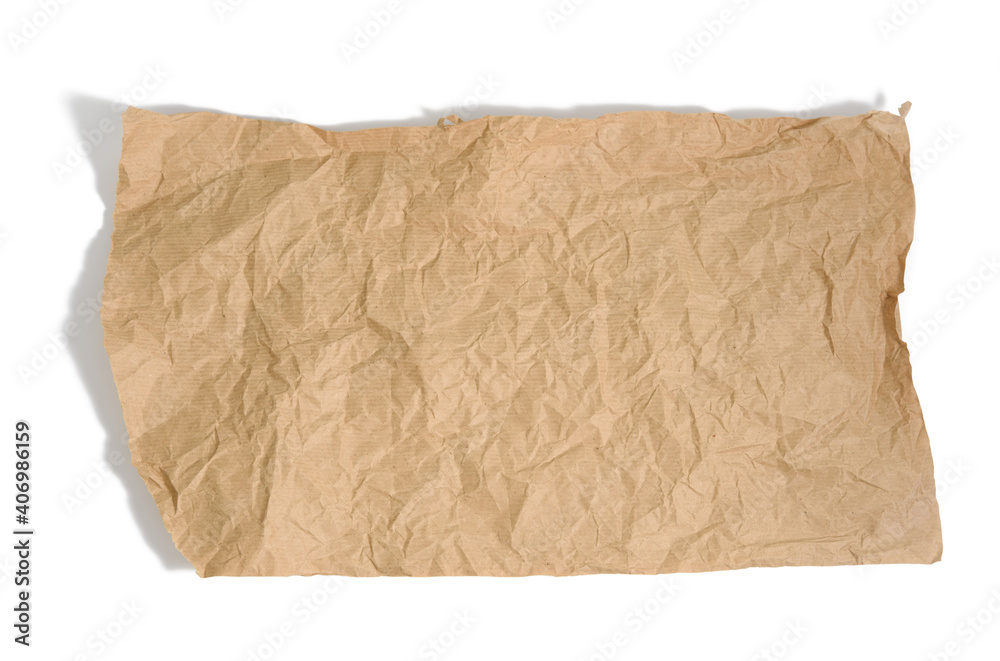 piece of brown parchment paper with torn edges isolated on white background
