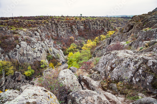 Aktovsky Canyon in Ukraine surrounded large stone boulders photo