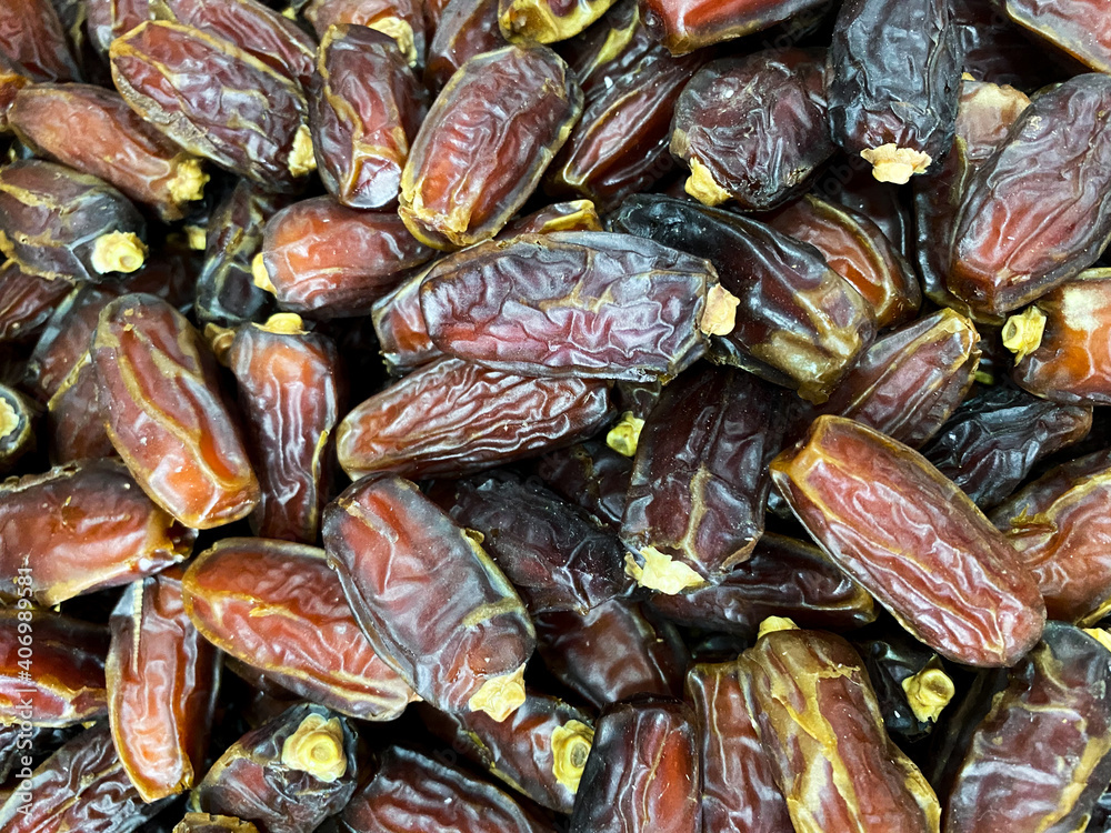 Dates on the market. Overhead view of dried fruit Dates on the market. Overhead view of dried fruit