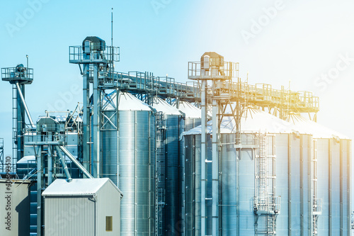 Morning light on grain storage silos