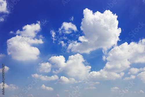 beautiful blue sky and white fluffy cloud horizon outdoor for background.