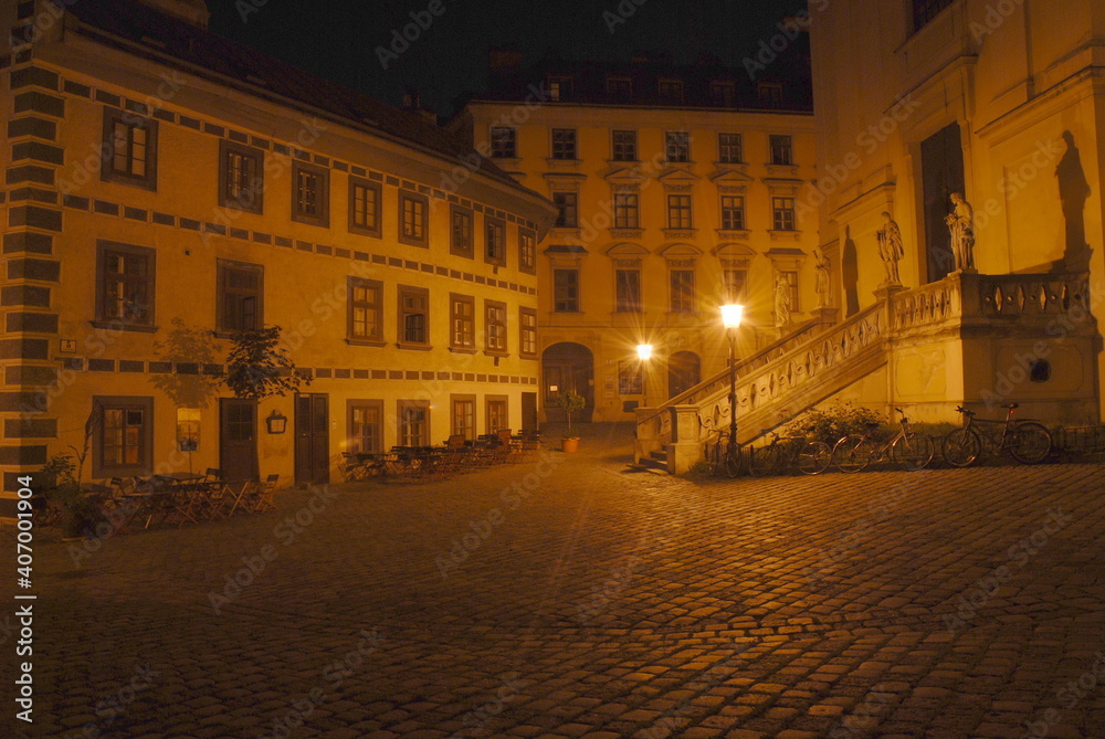 Night picture of old square with a church, St Ulrichsplatz in Vienna