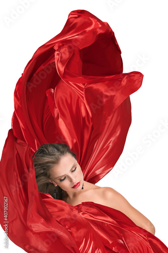 Portrait of young beautiful woman with red silk