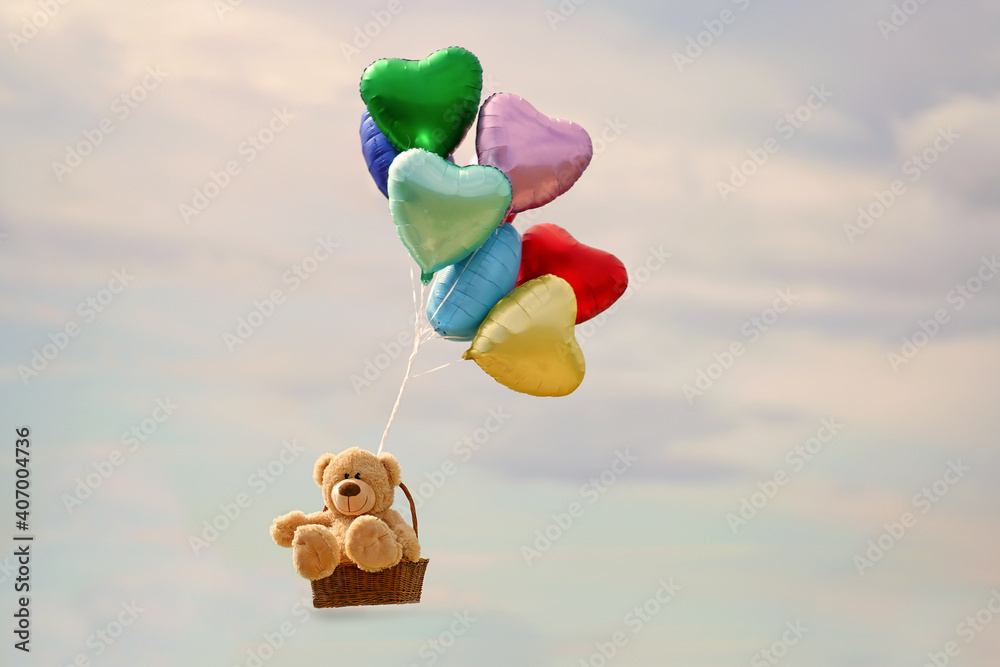 Foto Teddy mit bunten Herzballons