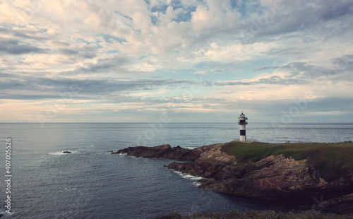 A lighthouse at sunset. Galicia coast