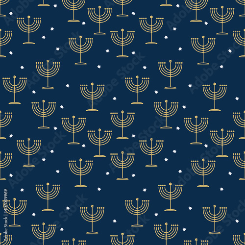 Seamless holiday pattern with Jewish symbols: golden Menorah and white Stars of David on a dark blue backdrop 