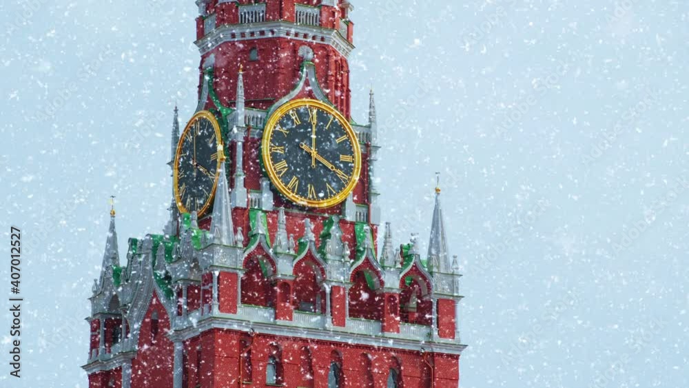 Moscow, Russia. Red Square, Kremlin. Spasskaya Tower against the gray winter sky with falling snow. Live UHD footage plus CG.