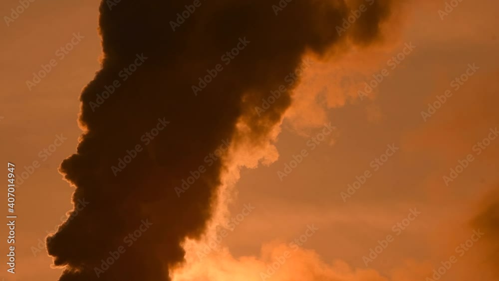 4K Video with clouds of smoke from a thermal pipe during an amazing winter freezing sunrise environmental global warming 4K Video with clouds of smoke from a thermal pipe during an amazing winter freezing sunrise environmental global warming