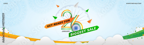 Indian Republic Day Sale Website Banner with Indian Flag Tri colors Ribbon 26 text and Ashoka wheel on sky Background