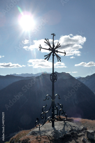 Summit cross of Sonnenberg mountain, Bavaria, Germany photo