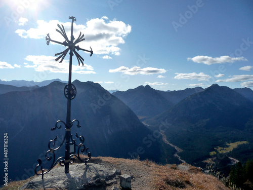 Summit cross of Sonnenberg mountain, Bavaria, Germany photo