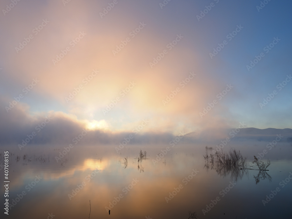 Winter morning fog at Bellus reservoir, Spain Winter morning fog at Bellus reservoir, Spain