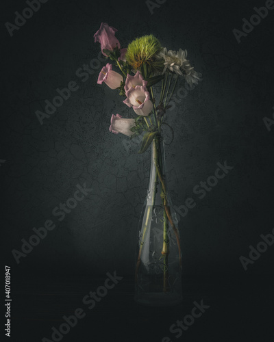 Bouquet of flowers in a vase and dark background