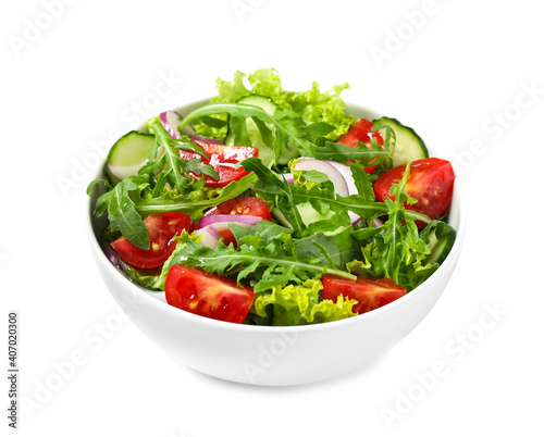 Delicious salad with arugula and vegetables isolated on white