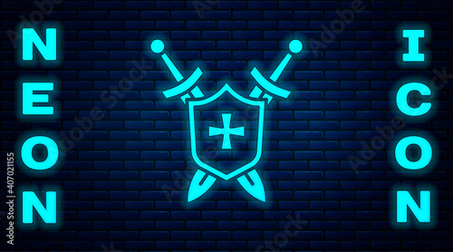 Glowing neon Medieval shield with crossed swords icon isolated on brick wall background. Vector.