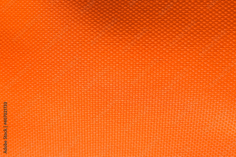 Texture of beautiful orange fabric as background, closeup view Texture of beautiful orange fabric as background, closeup view