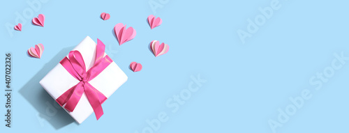 Valentines day or Appreciation theme with a gift box and paper craft hearts