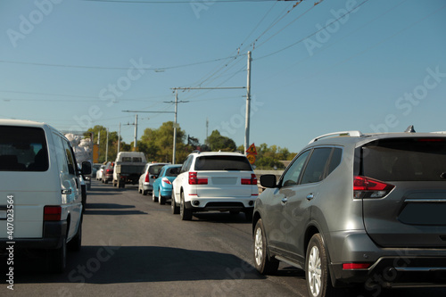 Modern cars in traffic jam on bridge