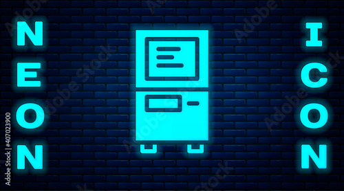 Glowing neon ATM - Automated teller machine icon isolated on brick wall background. Vector.