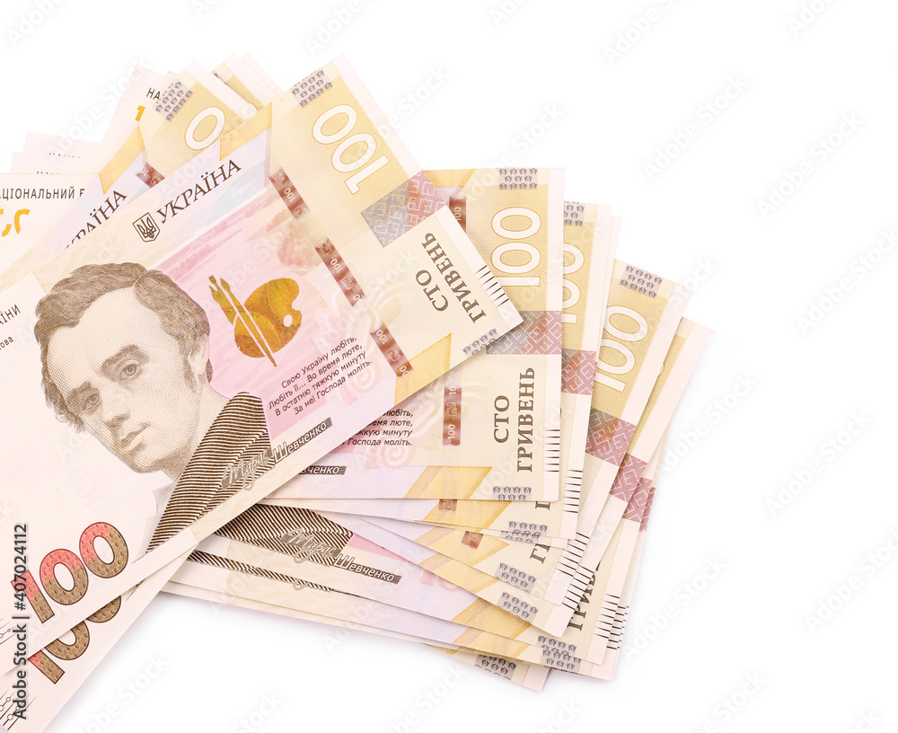 100 Ukrainian Hryvnia banknotes on white background, top view 100 Ukrainian Hryvnia banknotes on white background, top view