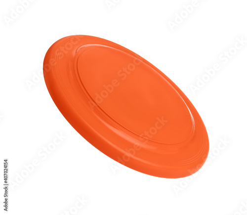 Orange plastic frisbee disk isolated on white photo