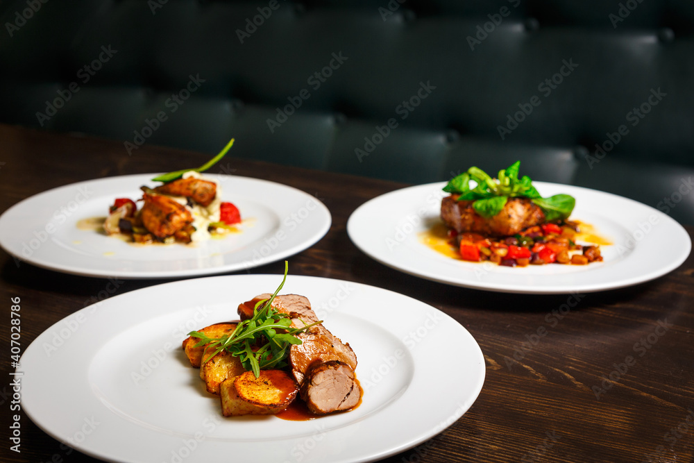 three different dishes of chicken, beef and pork three different dishes of chicken, beef and pork